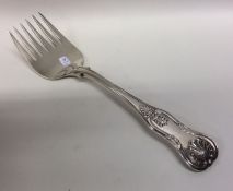 A heavy Kings' pattern silver serving fork. London