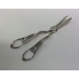A good pair of Edwardian silver grape scissors wit