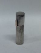A good quality silver engine turned lipstick holde