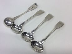 A set of four fiddle pattern silver salt spoons. L