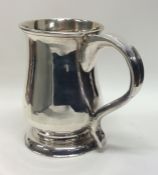 NEWCASTLE: A heavy 18th Century mug on pedestal fo