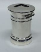 A novelty silver stamp box in the form of a letter
