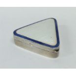A stylish silver and enamelled triangular pill box