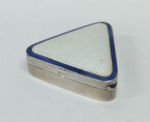 A stylish silver and enamelled triangular pill box