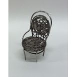 A Continental silver novelty model of a chair with