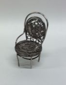 A Continental silver novelty model of a chair with