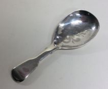 An engraved silver caddy spoon. London 1820. By He