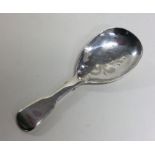 An engraved silver caddy spoon. London 1820. By He