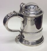 A good Georgian silver dome top lidded tankard on