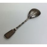 An Edwardian silver jam spoon. London. By NHA. App