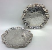 A pair of Georgian silver engraved salvers of shap