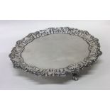 A fine quality circular silver salver with shaped