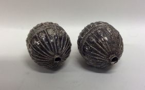 Two Antique Islamic silver balls. Marked to sides.