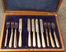 A cased set of six (plus five) silver handled kniv