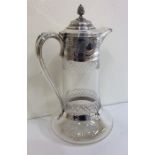 A large attractive silver mounted cut glass claret