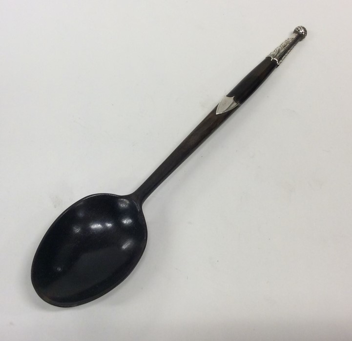A silver and tortoiseshell mounted spoon. Approx.