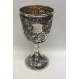 A good quality Chinese silver goblet profusely dec