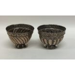 A pair of Turkish silver zarfs. Marked to bases. A