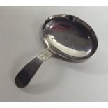 An unusual Georgian silver bright cut caddy spoon.