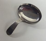 An unusual Georgian silver bright cut caddy spoon.