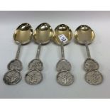 A heavy set of four Chinese silver teaspoons with
