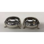 A pair of Victorian circular silver salts with bea