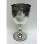 A Victorian silver goblet decorated with swags and