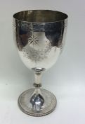 A Victorian silver goblet decorated with swags and