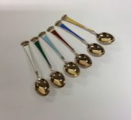 An attractive set of six silver and enamelled teas