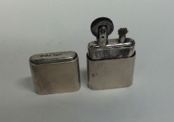 An Edwardian silver lighter, inscribed, 'The Howit