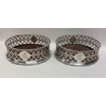 A good pair of George III pierced silver wine coas