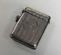A large engine turned silver hinged top vesta case