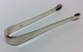 A good pair of George III silver sugar tongs. Lond