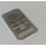 A small fine silver 1 ounce bar. Est. £25 - £35.