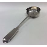 A Russian silver spoon with pouring lip. Punched,