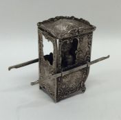 An unusual model of a sedan chair. Est. £15 - £20.