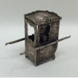 An unusual model of a sedan chair. Est. £15 - £20.