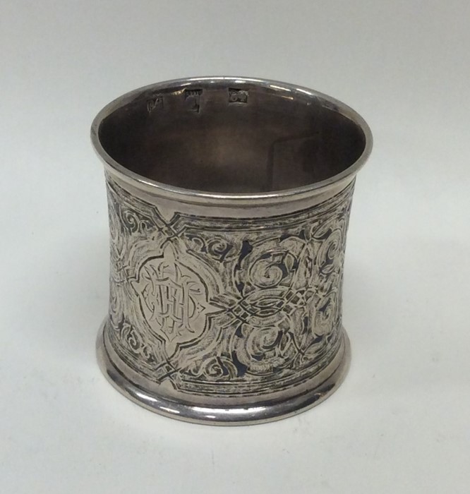 A large Russian silver napkin ring with Niello dec