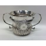 A large Georgian silver porringer of typical form.