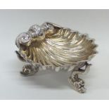 A good quality cast silver model of a shell with g