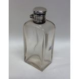 A rectangular glass mounted hinged top scent bottl