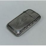 A Sterling silver hinged top vesta case. Approx. 2