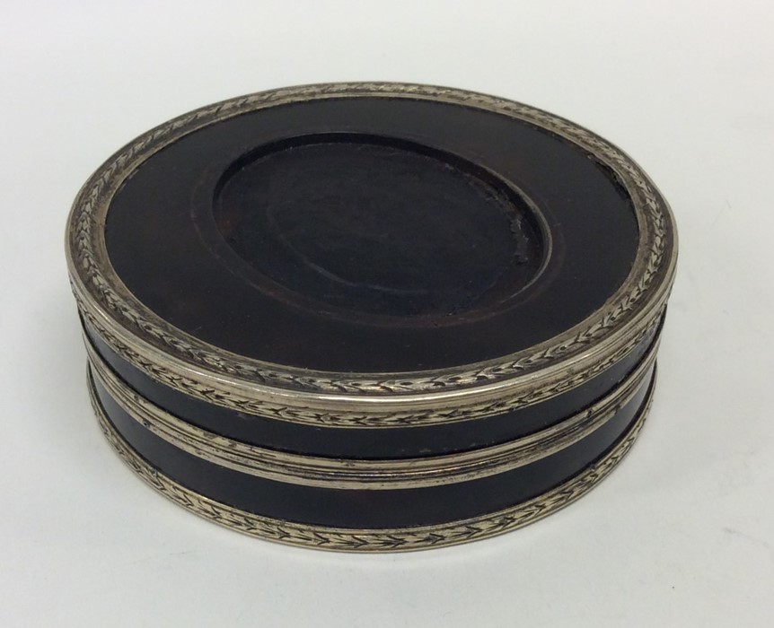 A Georgian silver and tortoiseshell circular box w