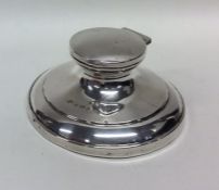 A circular hinged top silver inkstand. Birmingham