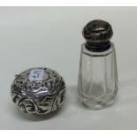 A small chased silver pill box together with a sce