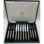 A good set of six ivory mounted steak knives and f