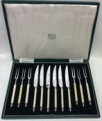 A good set of six ivory mounted steak knives and f