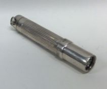 An unusual silver torch with reeded body. Approx.
