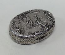 A small Continental silver chased box decorated wi