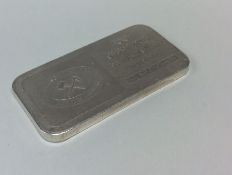 An unusual silver 100 grams ingot. Est. £80 - £120